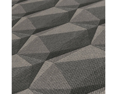 Närbild av en strukturtapet med ett tredimensionellt geometriskt mönster