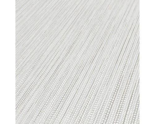 Detaljvy av en vit vinyltapet med randigt mönster.
