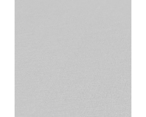 Närbild av en strukturerad, ljus tapet.