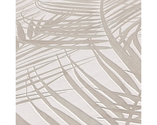 Närbild av en strukturerad tapet med palmbladsmotiv