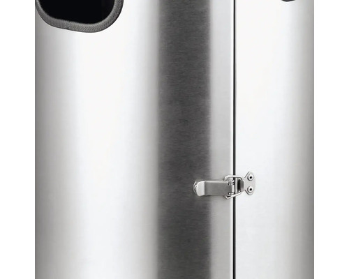 Detaljvy av en soptunna i metall med stängning