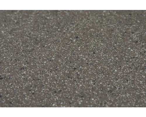 Närbild av en bänkskiva med en prickig yta