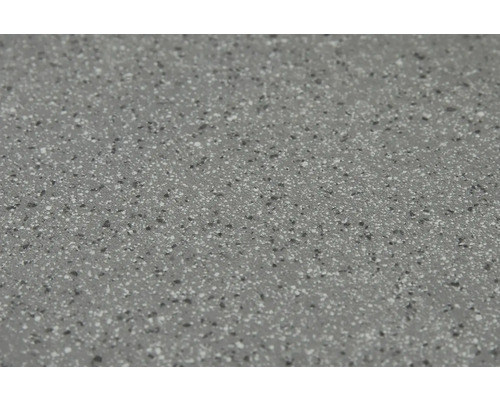 Närbild av en bänkskiva med en prickig yta