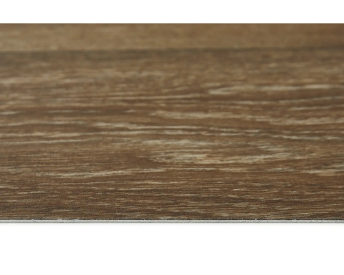 Detaljbild av ett vinylgolv med träutseende