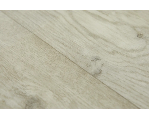 Närbild av ljust laminatgolv