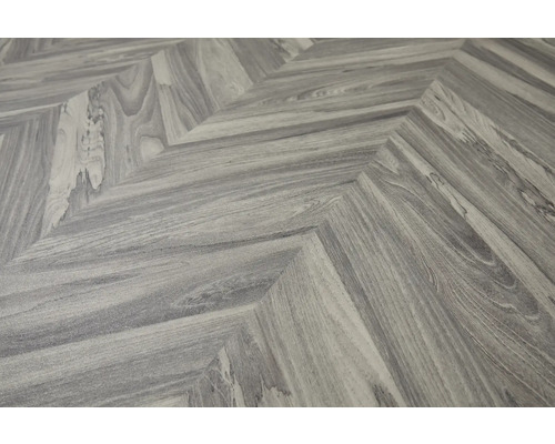 Närbild av ett golv med fiskbensmönster