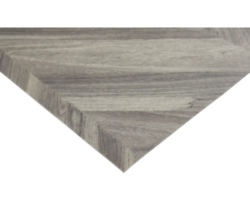 Detaljvy av en bordsskiva med träutseende