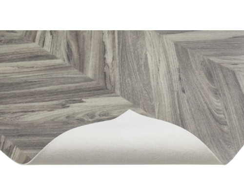 Vinylgolv i fiskbensmönster med vit baksida