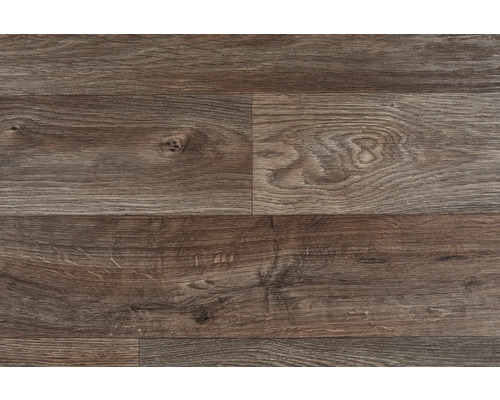 Detaljvy av laminatgolv med träutseende