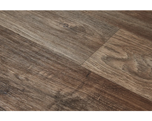 Närbild av laminatgolv med träutseende