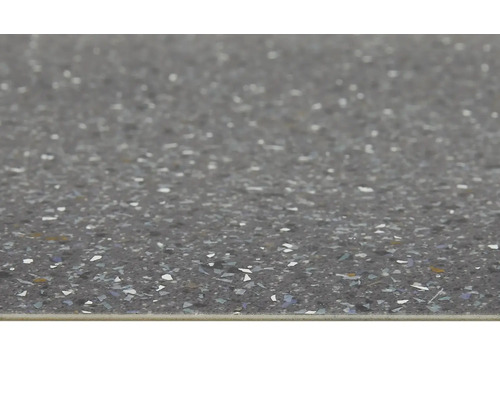 Närbild av en bänkskiva med en spräcklig yta