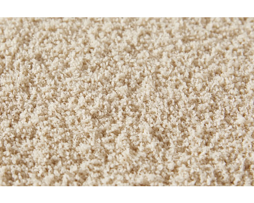 Närbild av en beige matta