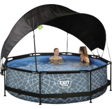 Rund pool med tak och stenmönster