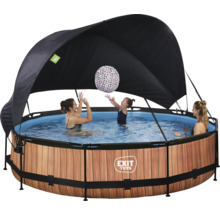 Rund pool med tak och lekande människor i vattnet