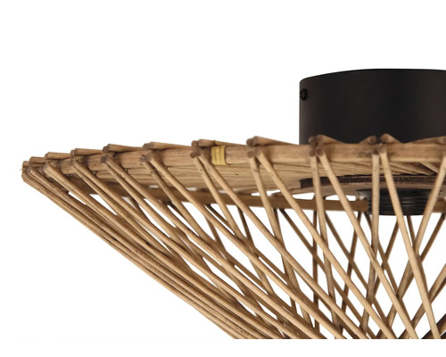 Detaljbild av en taklampa i rotting