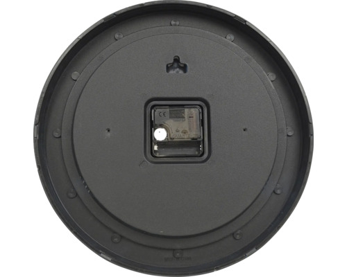 Baksidan av en väggklocka med urverk och upphängning