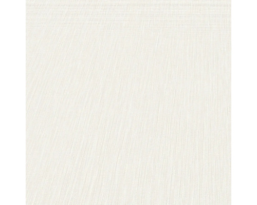 Närbild av en beige tapet med lätt textur.