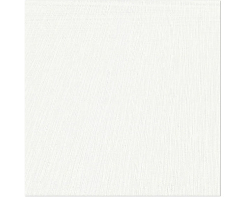 Närbild av en vit matta med subtil struktur