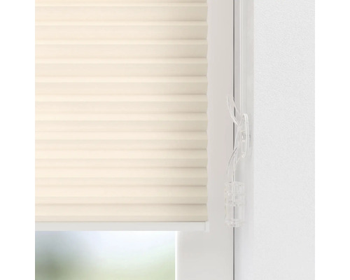Närbild av en beige plisségardin för fönster med kontroll