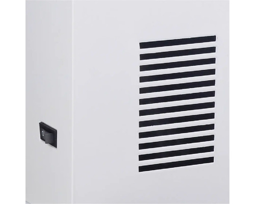 Detaljvy av ett ventilationsgaller och en strömbrytare.