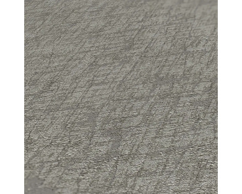 Närbild av en grå strukturtapet.