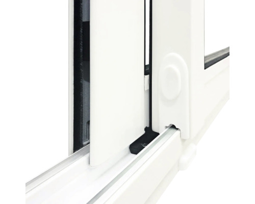 Detaljvy av ett skjutfönster med styrskena