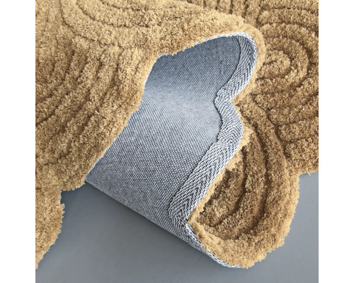 Tuftad matta med slingrande design och halkfri baksida