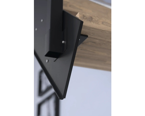 Detaljvy av bordsfäste av metall