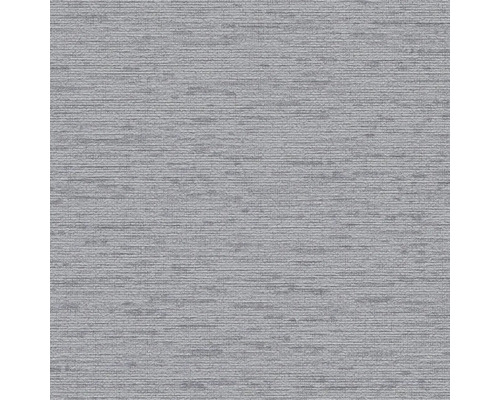 Detaljbild av en grå strukturtapet.