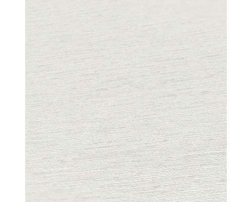 Närbild av en vit textiltapet med fin struktur