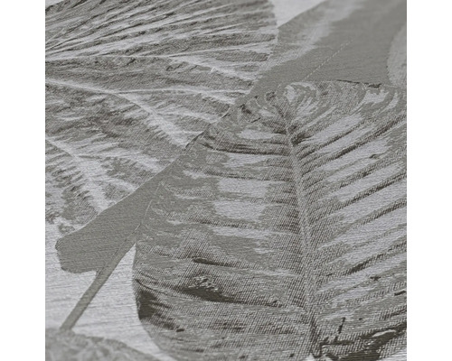 Närbild av en strukturerad tapet med bladmönster