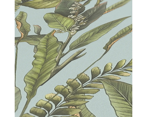 Närbild av en tapet med ett botaniskt mönster av löv och blommor.