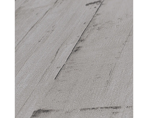 Närbild av ett laminatgolv med träutseende