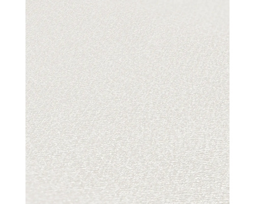 Närbild av en vit vinyltapet med fin struktur.
