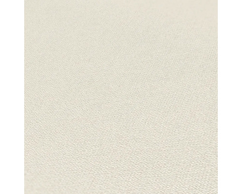 Detaljvy av en ljus tapet med textil struktur