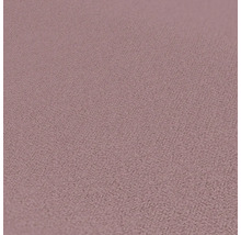 Närbild av en rosa textil tapet
