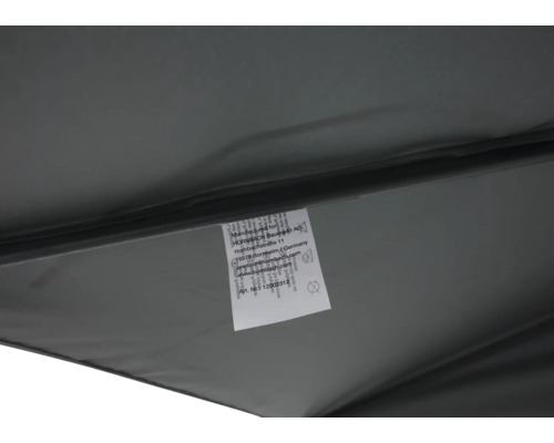 Etikett med tillverkarinformation