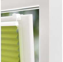 Detaljvy av en fönsterplissé på en fönsterram