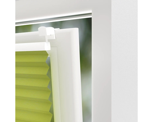 Detaljvy av en fönsterplissé på en fönsterram