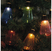 Dekorativ ljusslinga med färgade glödlampor i julgranen