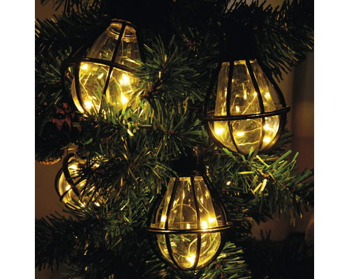 Dekorativ ljusslinga i päronform med LED på en julgran