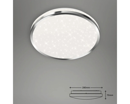 Rund taklampa med stjärnmönster och silverfärgad ram