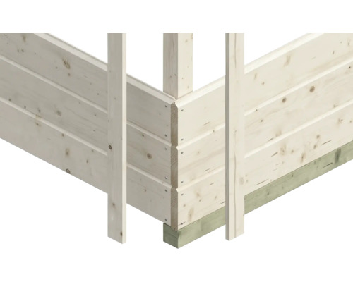 Hörndetalj av ett trähus med not- och fjäderfogar