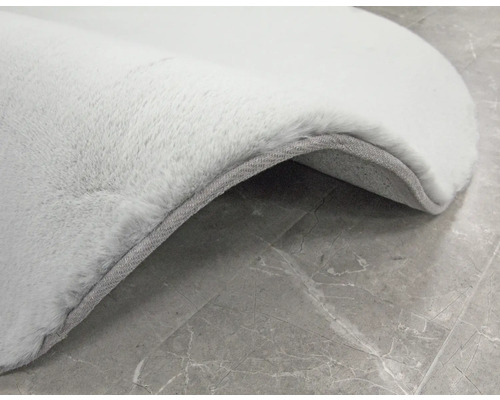 Detaljvy av en ljus matta med en mjuk yta