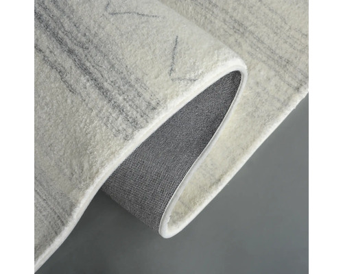 Matta med mönster och vävd baksida