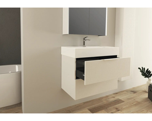 Modernt badrum med tvättställsskåp, handfat och spegelskåp för en stilfull atmosfär