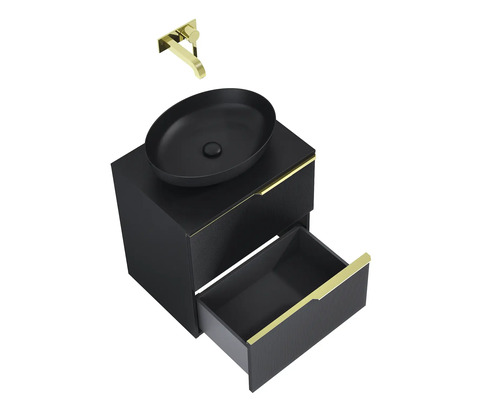 Tvättställsskåp med svart handfat och guldfärgad armatur