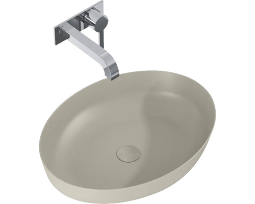 Tvättställ i keramik med väggmonterad blandare