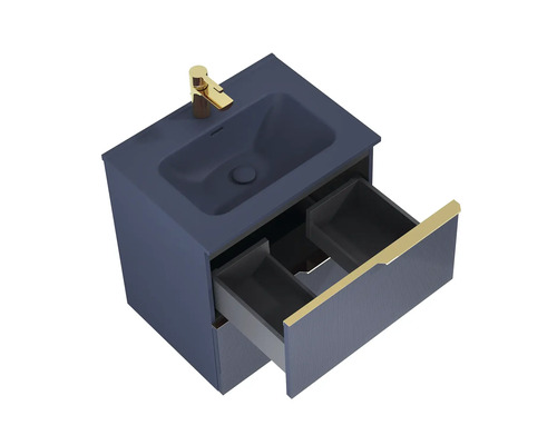 Tvättställsskåp med öppen låda och guldfärgad armatur