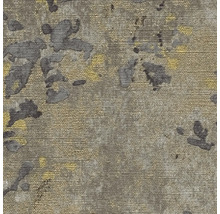 Närbild av en texturerad yta med färgfläckar